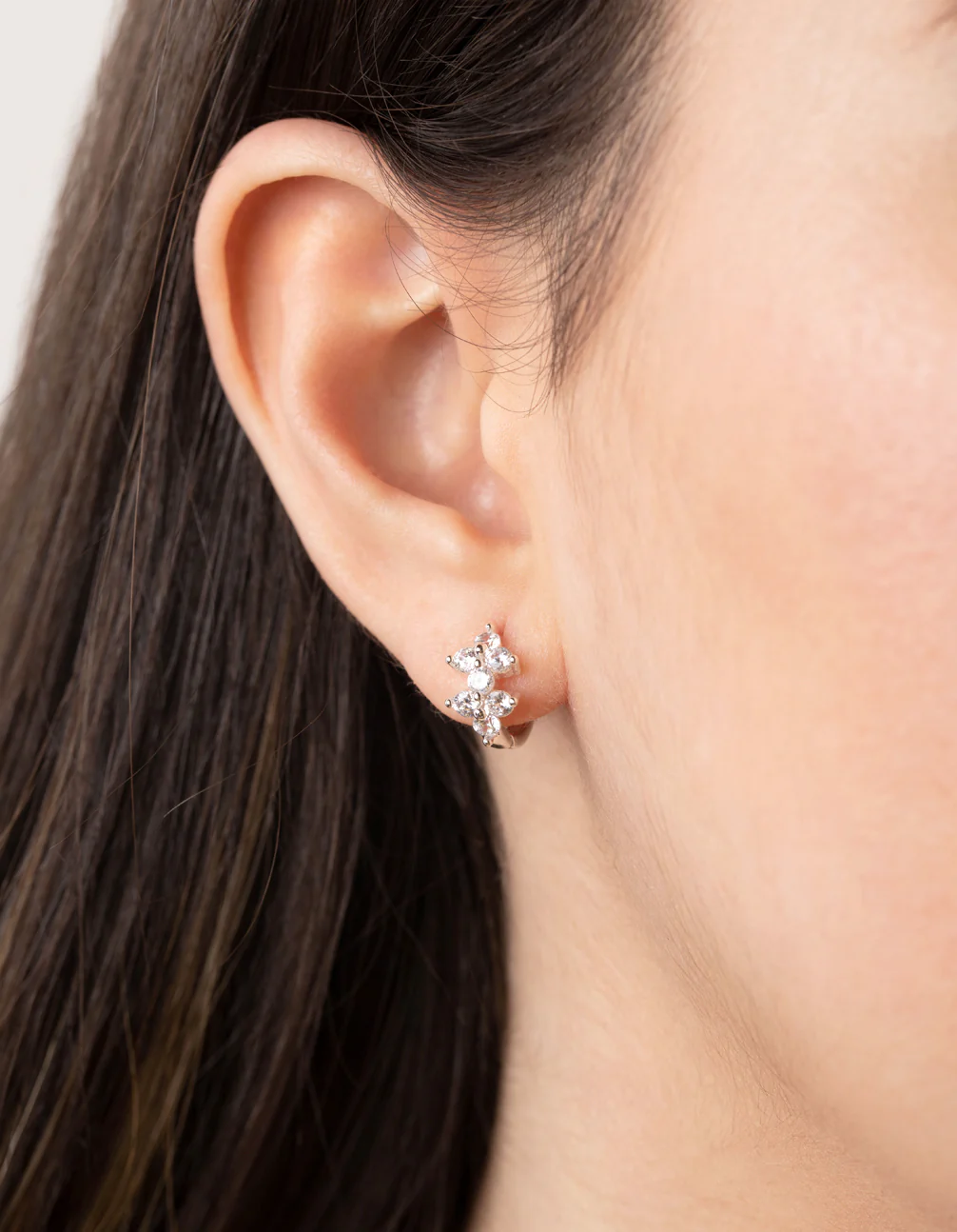 Silver Cubic Zirconia Double Flower Huggie Earrings - Image 2