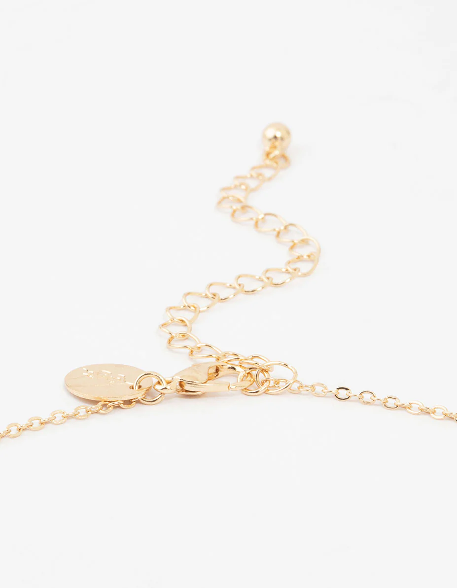 Gold Bubble Cross Necklace and Earrings Set - Image 3