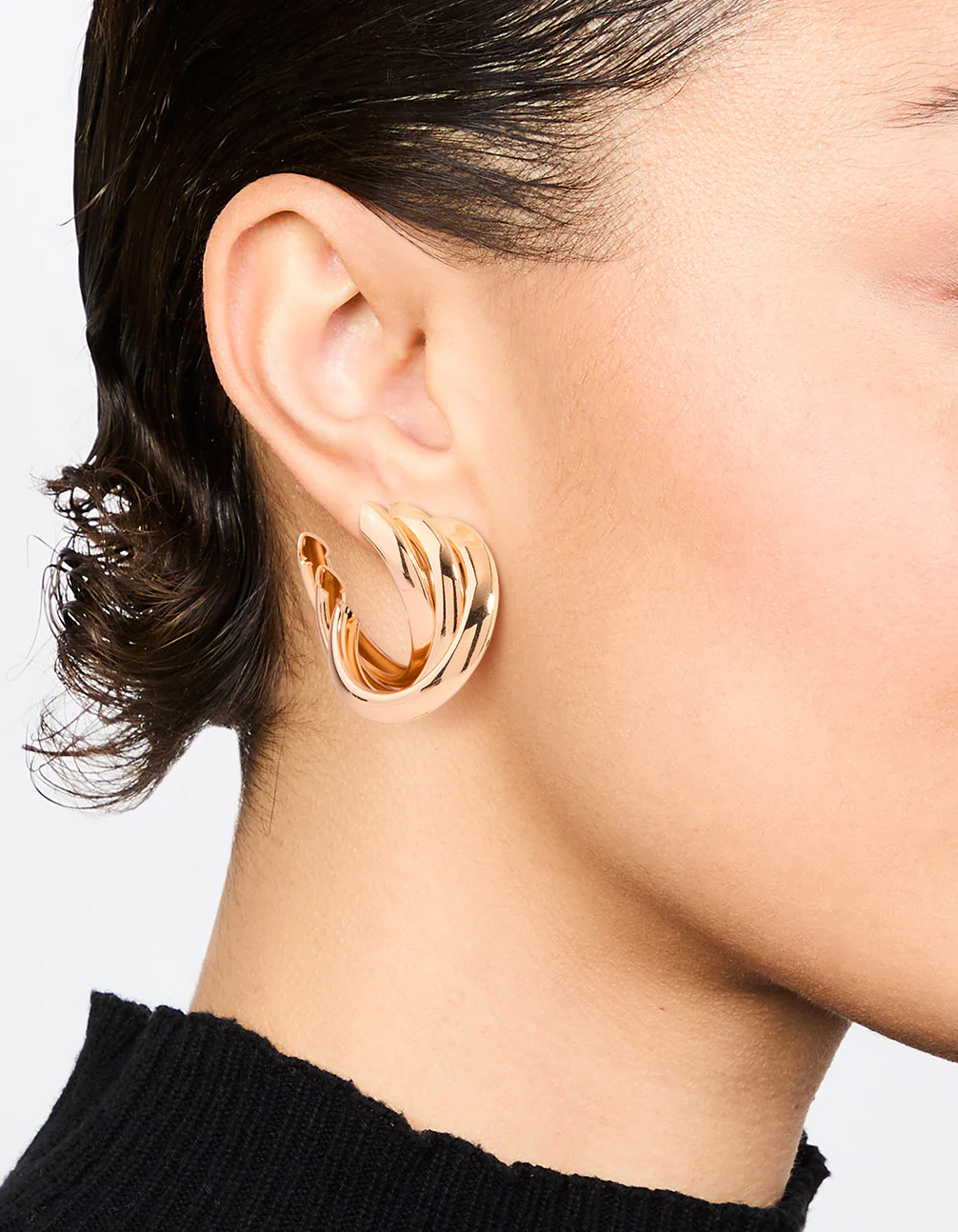 Gold Crossover Thick Hoop Earrings - Image 2