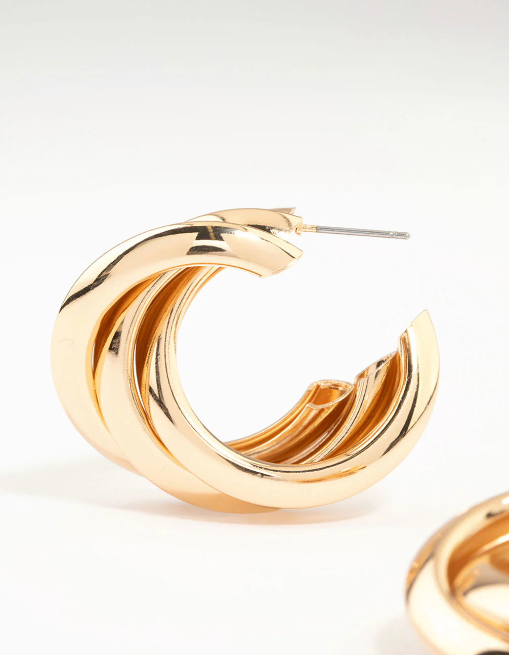 Gold Crossover Thick Hoop Earrings - Image 4