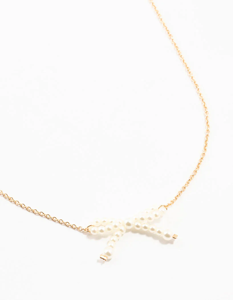 Gold Pearl Bow Necklace