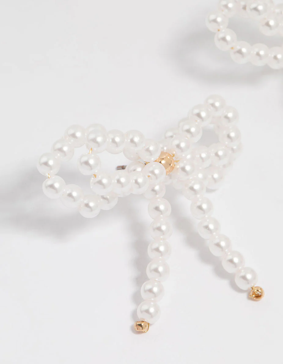 Gold Pearl Bow Stud Earrings - Image 2