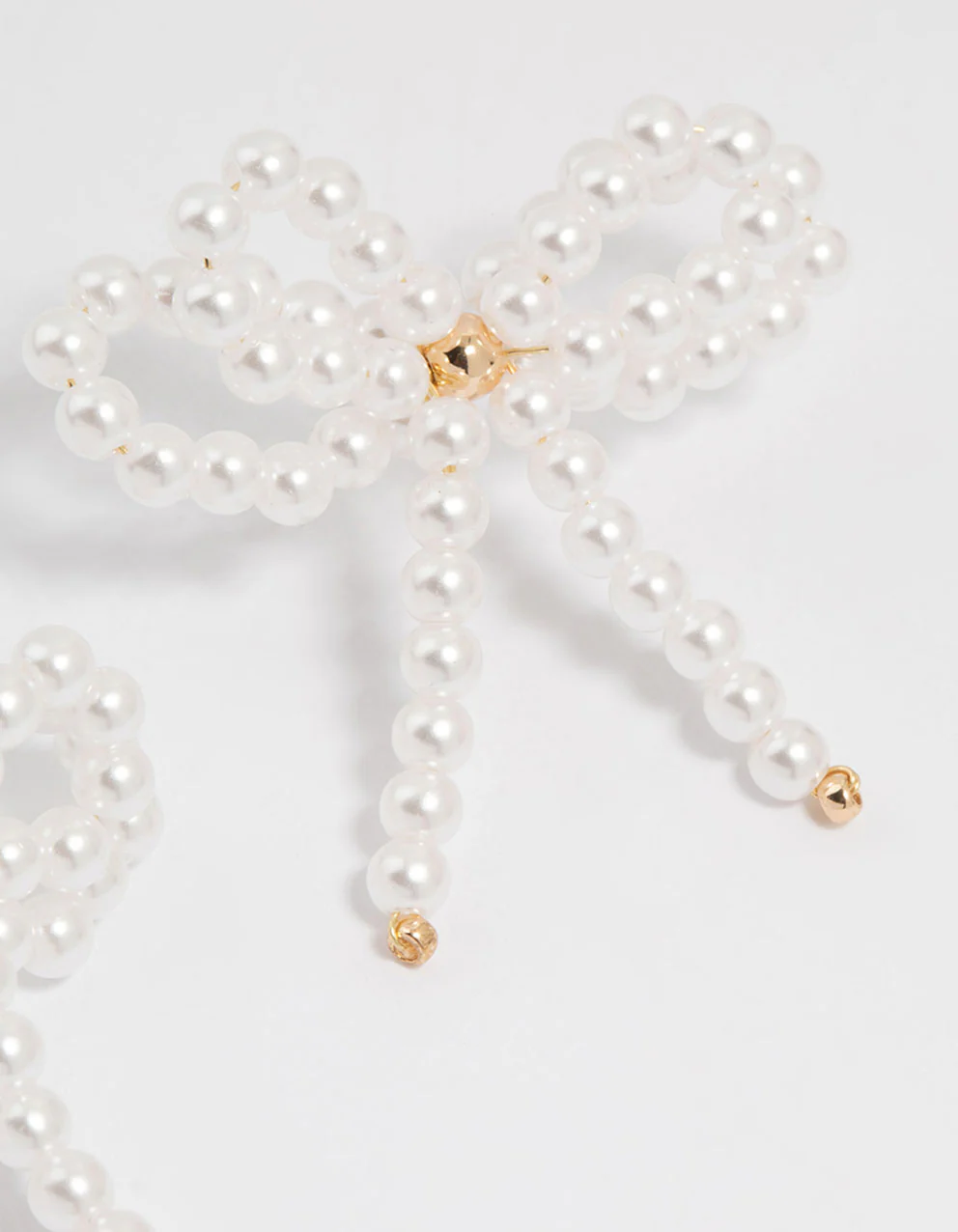 Gold Pearl Bow Stud Earrings - Image 3