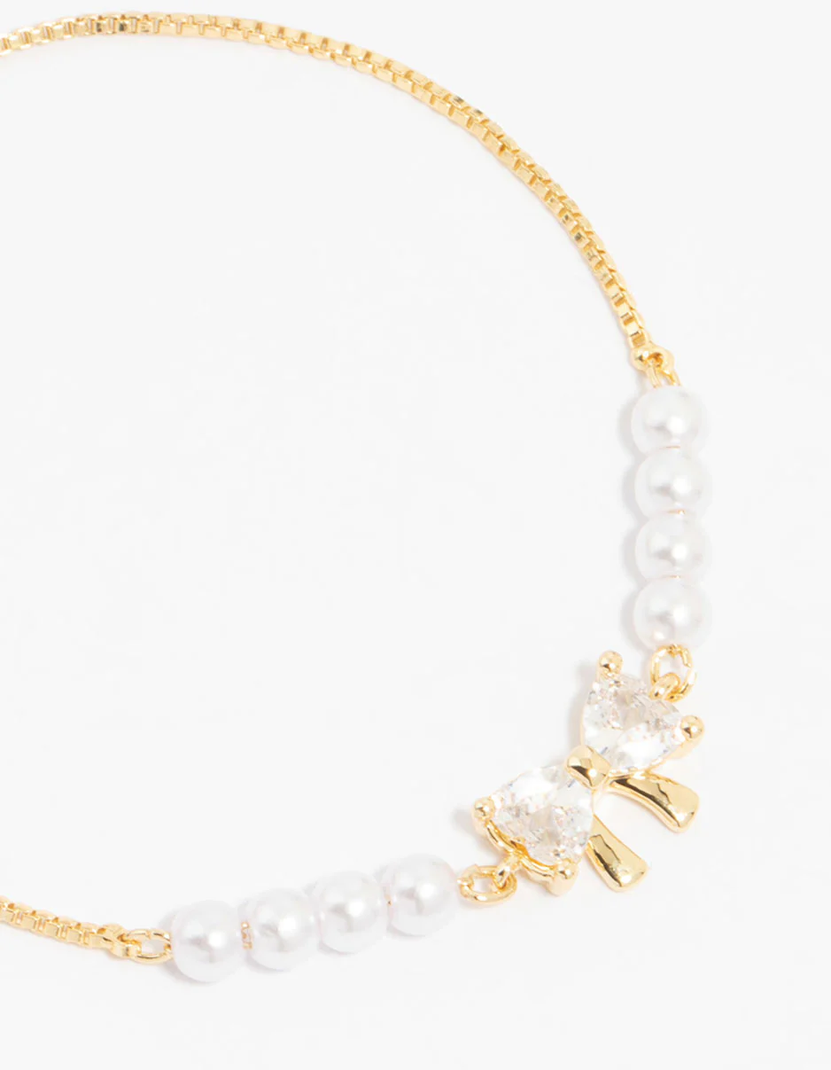 Gold Plated Cubic Zirconia Bow & Pearl Toggle Bracelet - Image 2