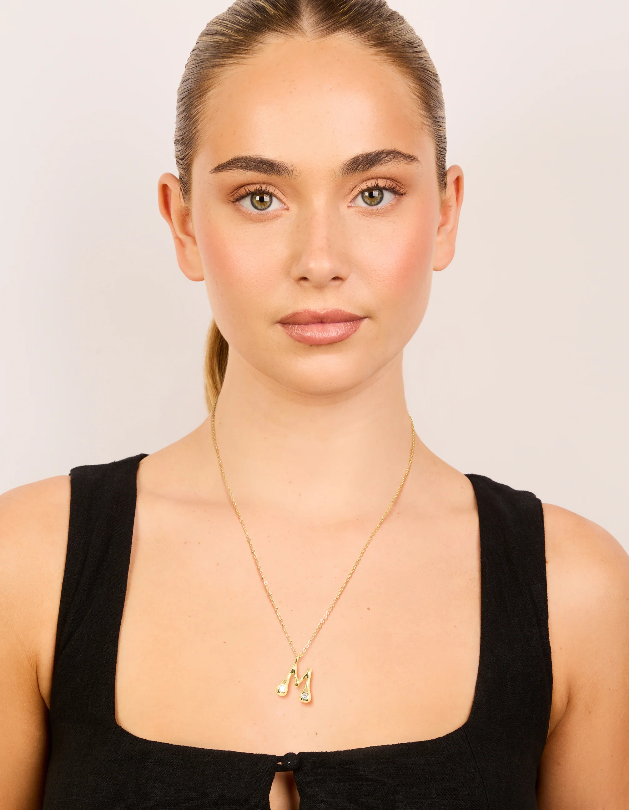 Gold Plated Cubic Zirconia Bubble Letter M Necklace - Image 3