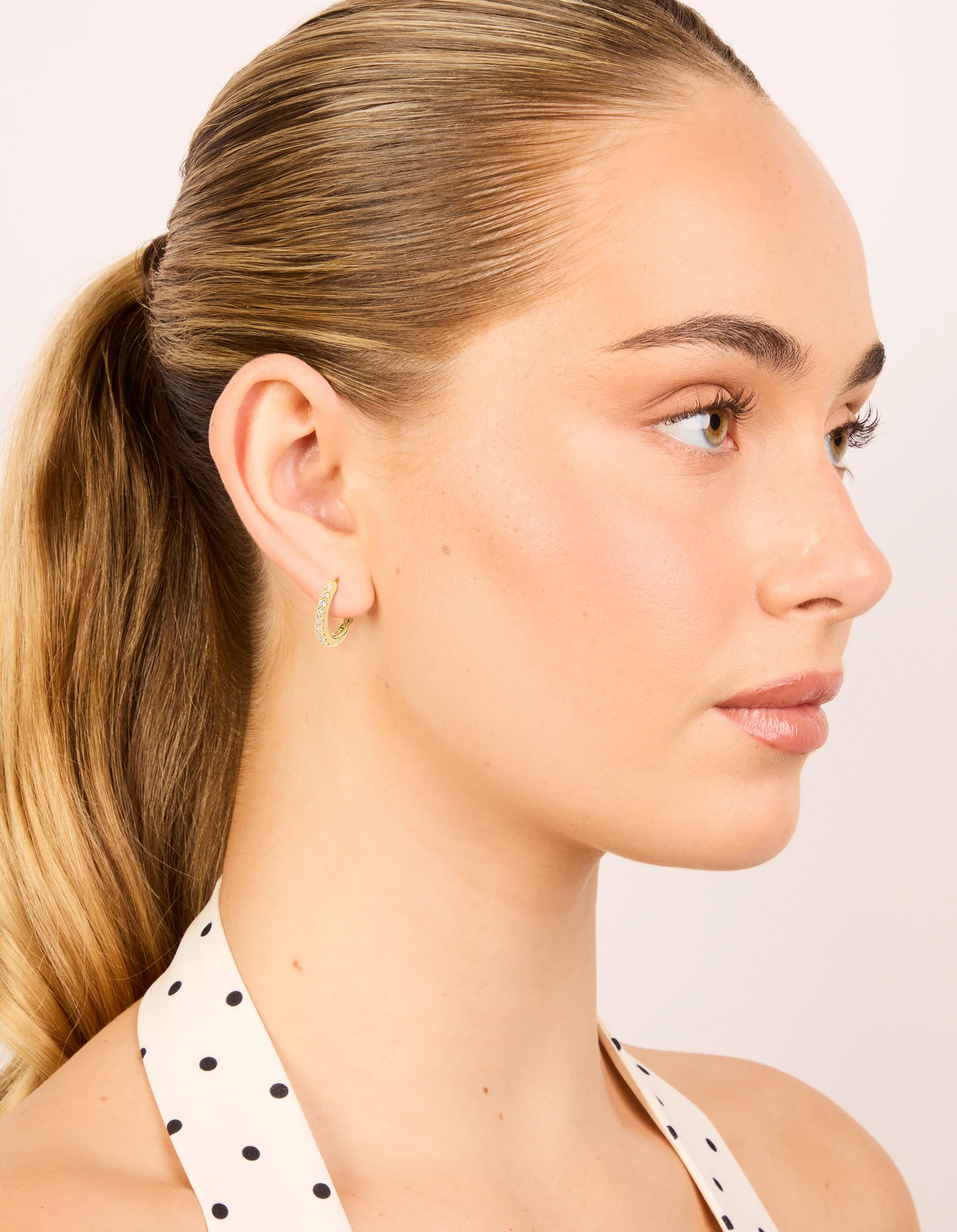 Gold Plated Cubic Zirconia Small Huggie Earrings - Image 3