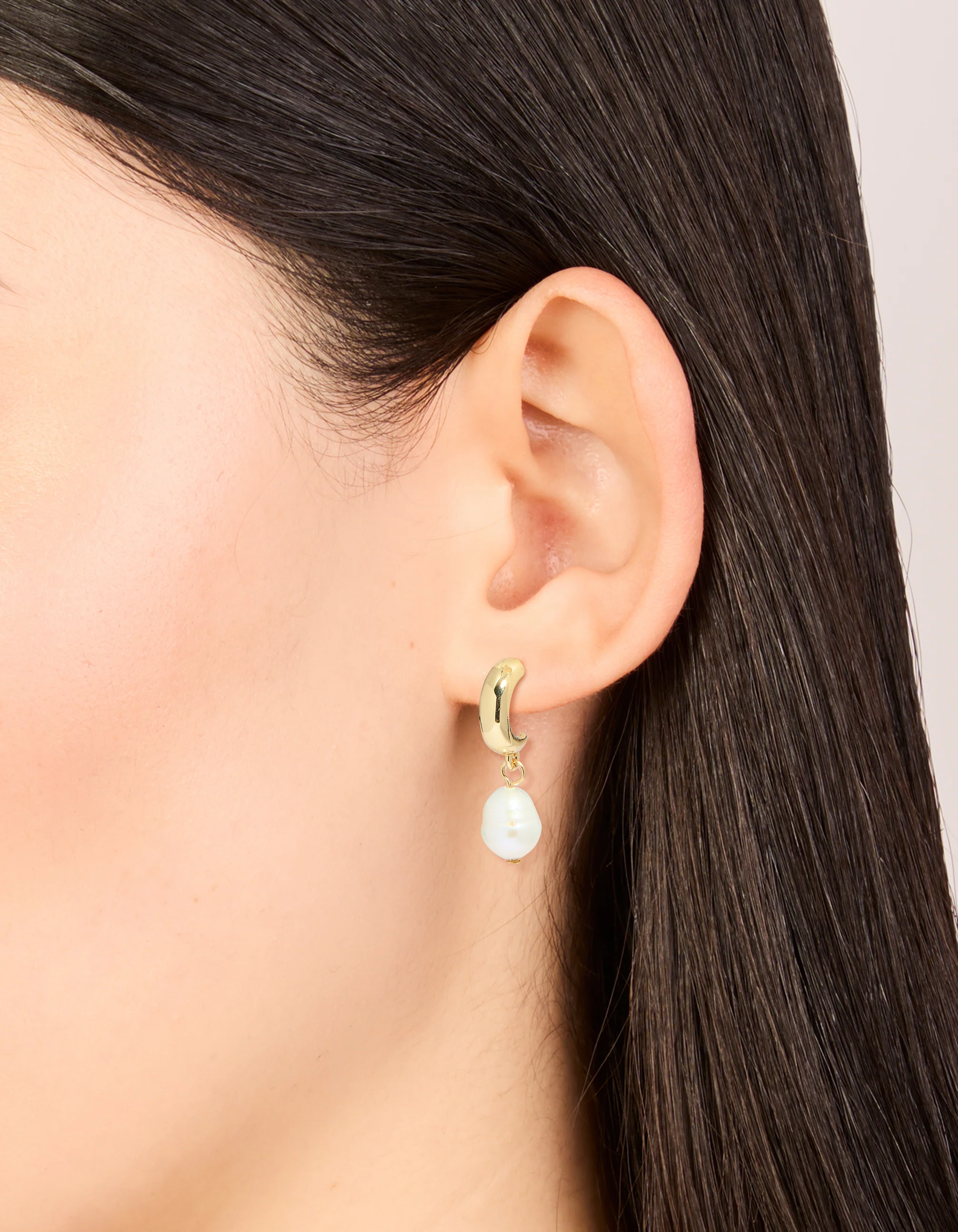 Gold Plated Freshwater Pearl Drop Huggie Earrings - Image 2