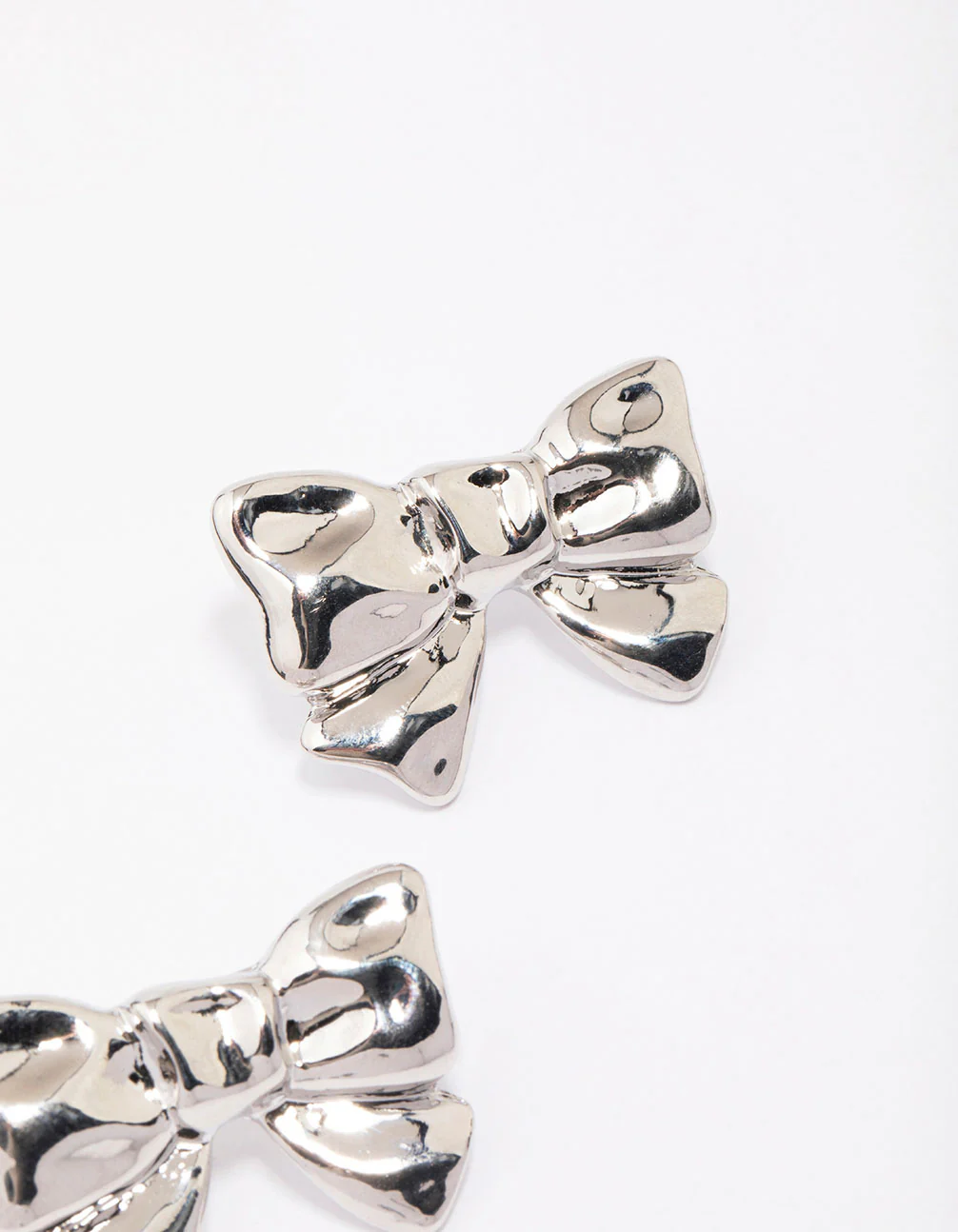 Silver Molten Bow Stud Earrings - Image 3