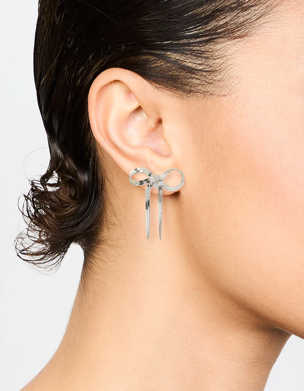 Silver Snake Chain Bow Stud Earrings - Image 2