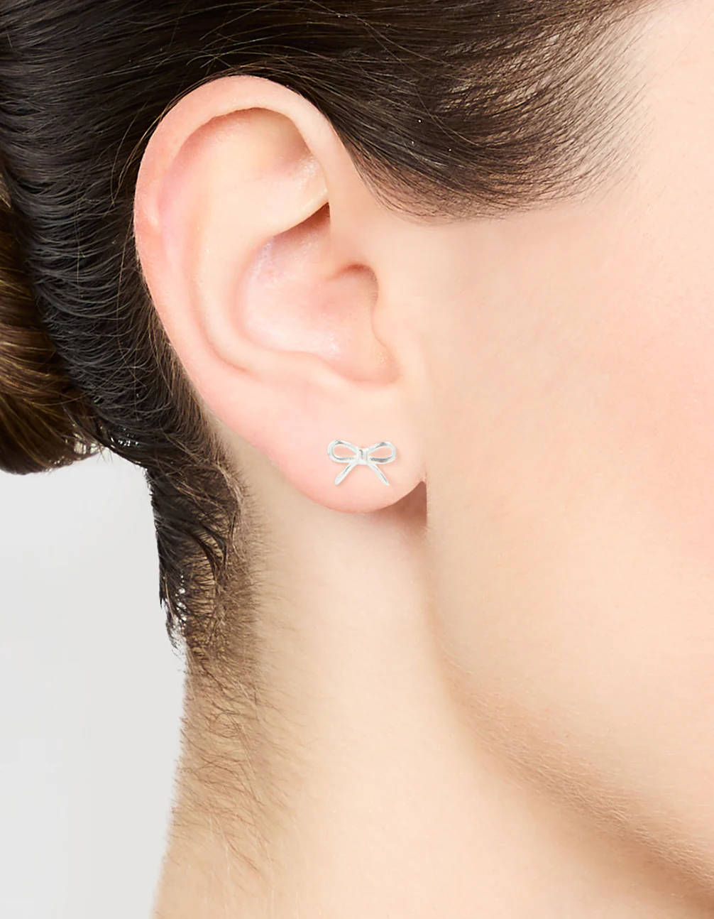 Sterling Silver Cut Out Bow Stud Earrings