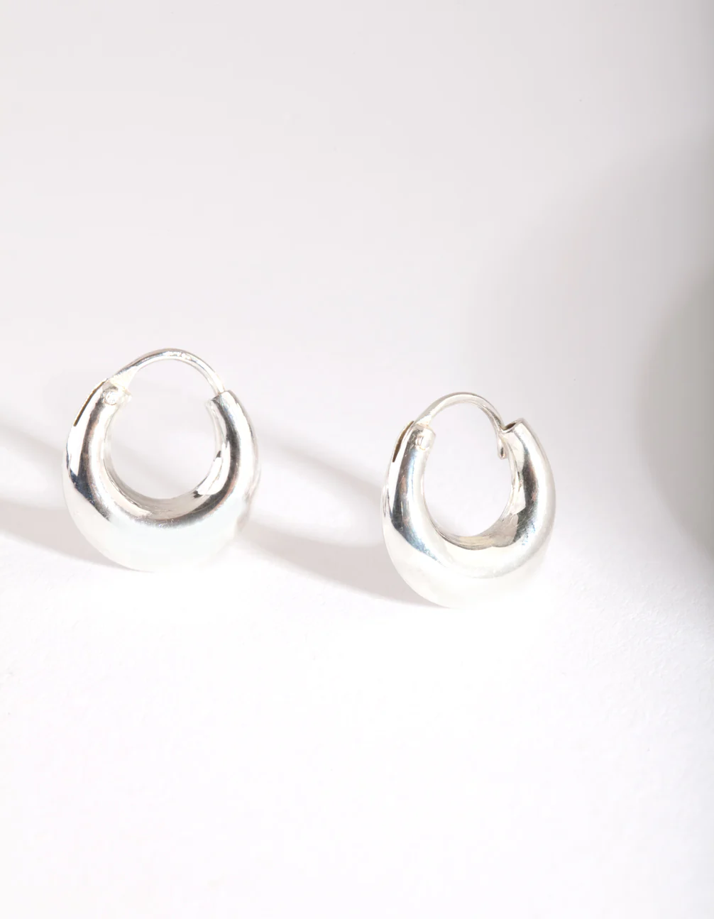 Silver Mini Chubby Huggie Earrings - Image 2